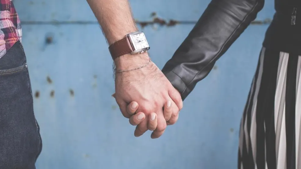 Casal com relógio